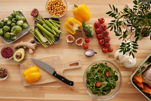 fresh garlic and onions on a wooden cutting board