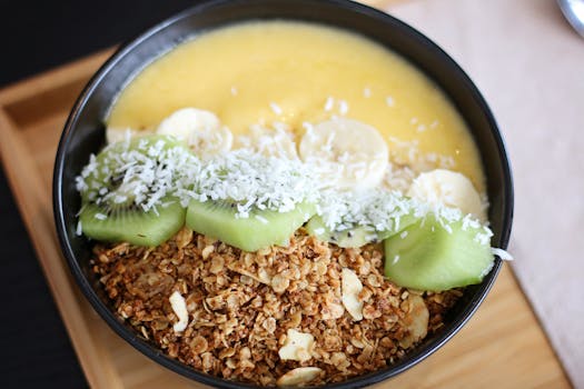 a bowl of yogurt topped with fruits