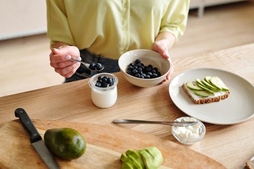 spreading yogurt on toast