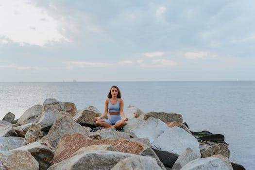 person practicing yoga in a peaceful setting